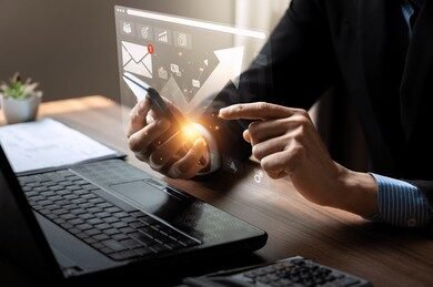 Businessman using smartphone for emails