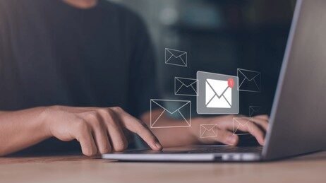 Person checking email on laptop