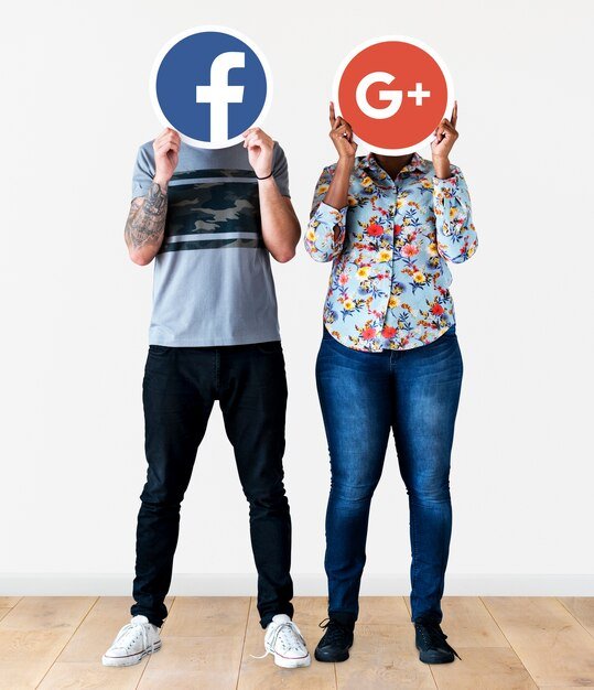 People holding Facebook and Google